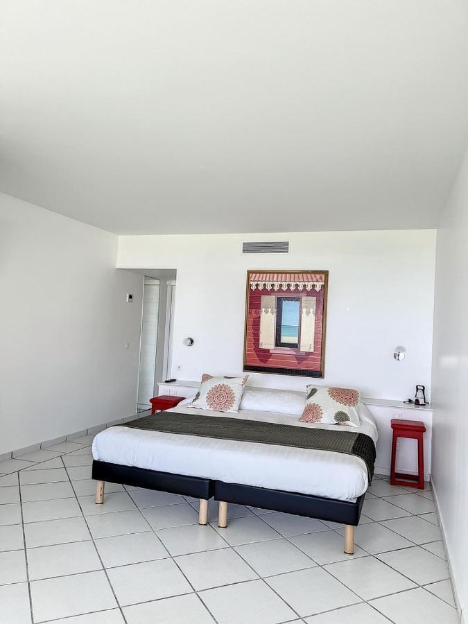 Le Domaine Anse Marcel Beach Resort Exterior foto